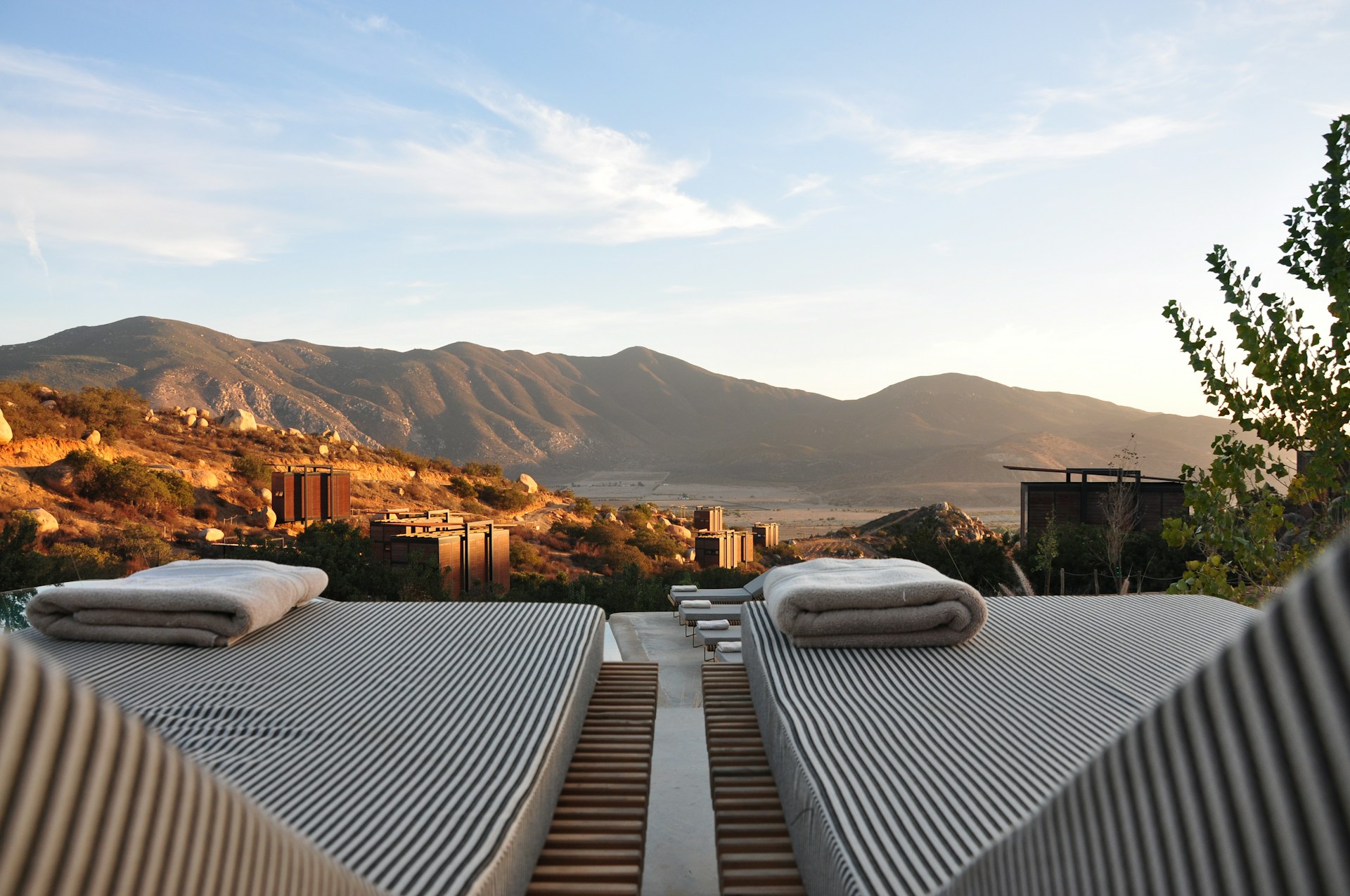 luxurious outdoor adventure beds overlooking mountain range